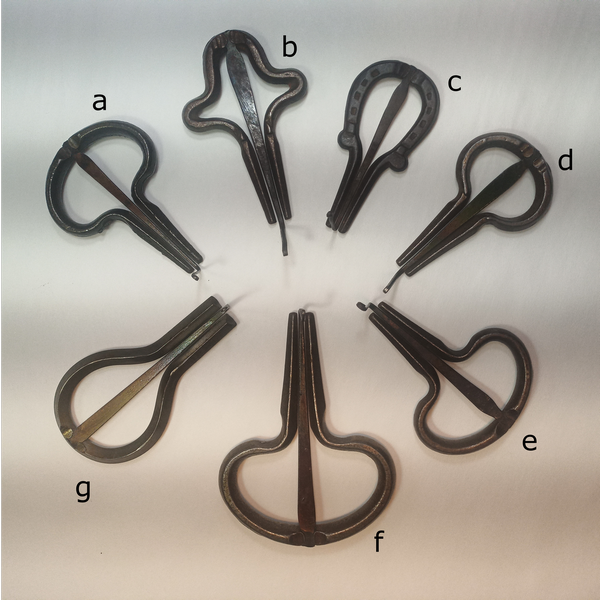 Various sizes and shapes of J. R. Smith Jew's harps.